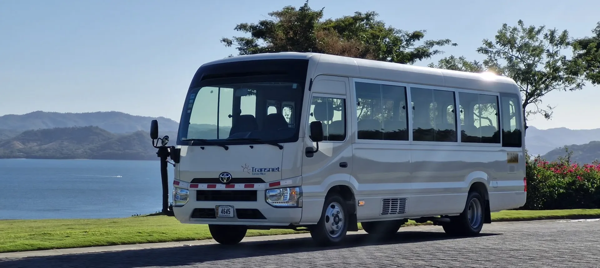 Transnet Toyota Coaster minibus parked by the ocean in Costa Rica