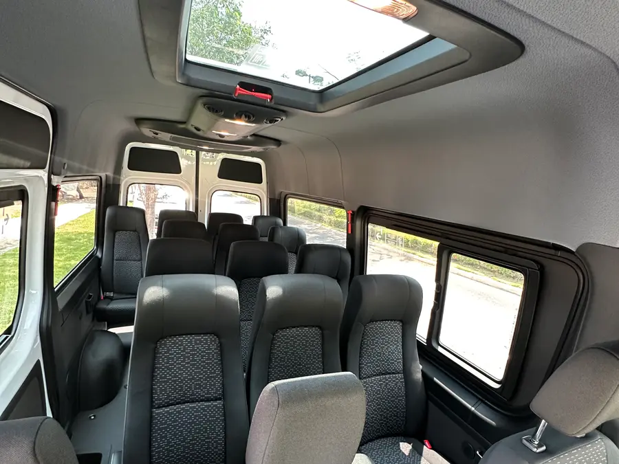 Rows of comfortable seats inside one of our vans